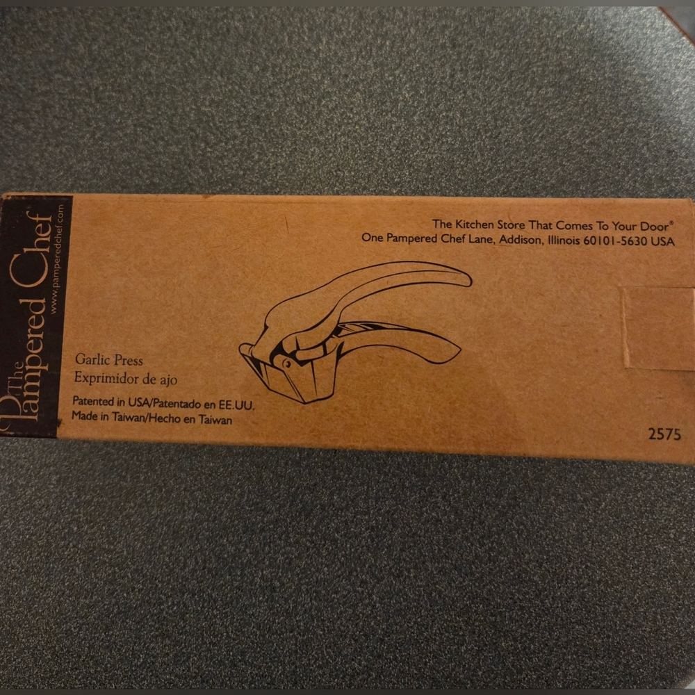 Pampered New In Box Garlic Press